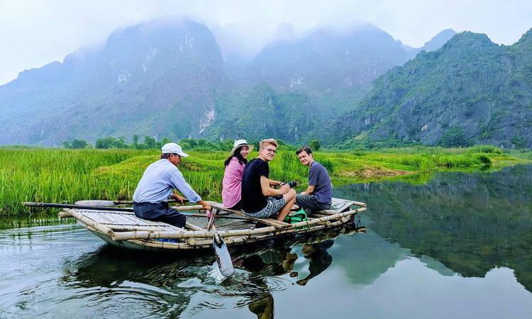 Van Long Nature Reserve - Boat rowing along Van Long